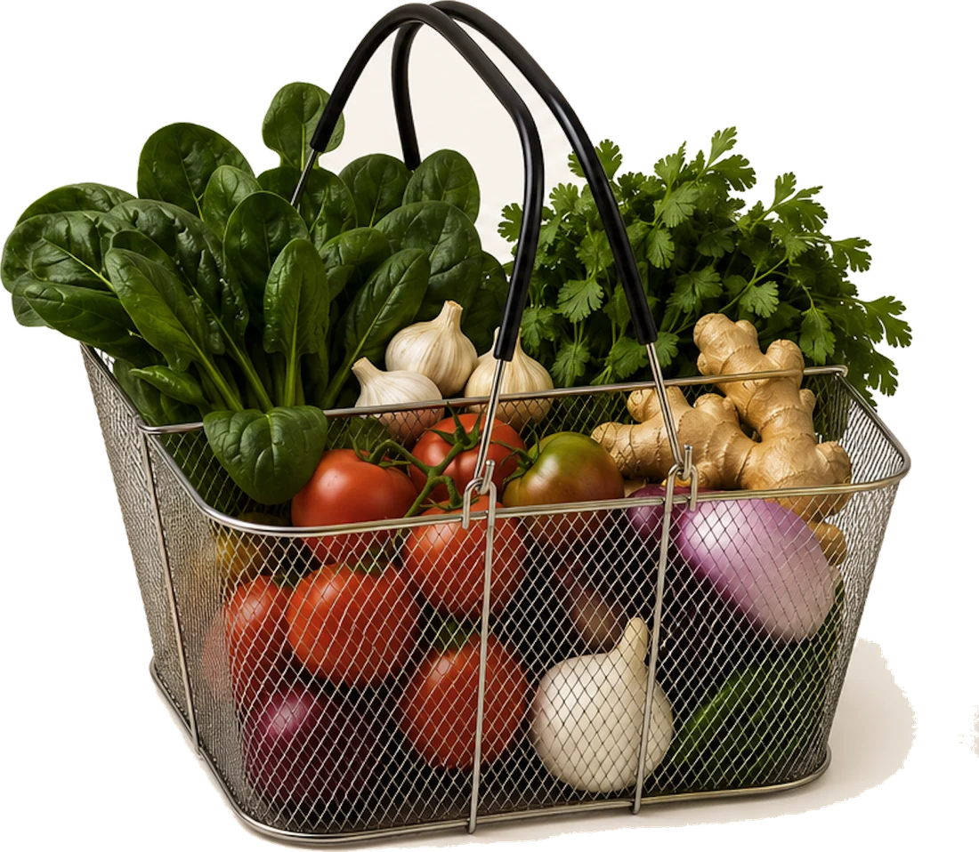 A market basket of spinach, coriander, ginger, garlic, tomatoes and onions