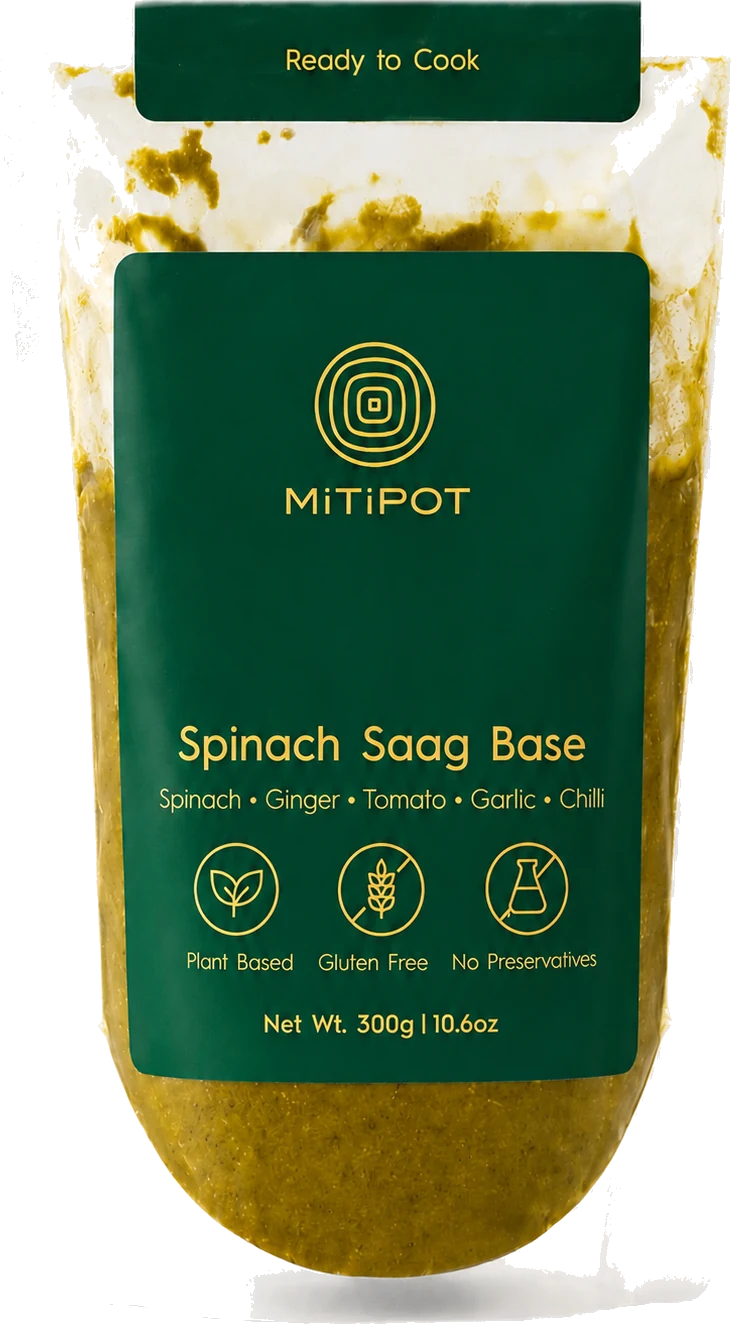 A Spinach Saag Base pouch — the same ingredients, slow-cooked and ready to cook